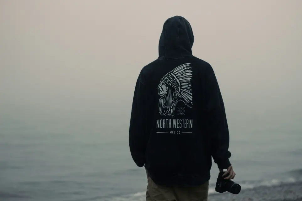 person facing body of water